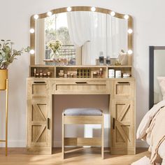 a bedroom with a vanity, stool and mirror on the wall in front of it