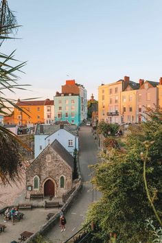 an aerial view of some buildings and people walking