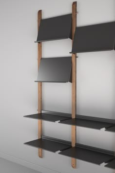 an empty shelf with three open shelves on each side and one closed shelf above it