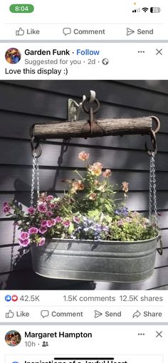 an old metal bucket with flowers hanging from it's side and the words garden junk follow above it