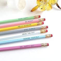 six pencils that say, think happy be bright, hello sunshine, stay plumpe, selfie the day and inspire yourself