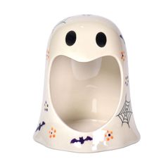 a ceramic dog bowl with a ghost face on it