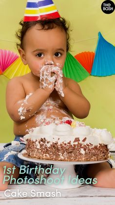 a baby sitting in front of a cake covered in frosting