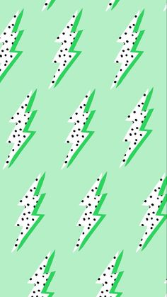 a green and white pattern with polka dots on the bottom, lightning bolt in the middle