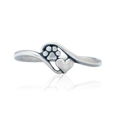 a silver ring with paw prints on it