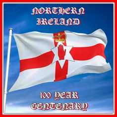 the flag of northern ireland is flying high in the blue sky with words written below it