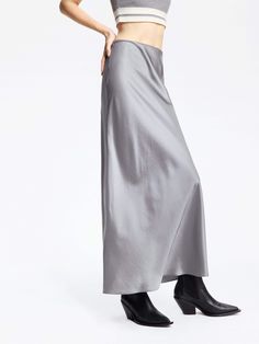 MO&Co. Women's High Rise Satin Maxi Skirt Introducing our satin skirt, crafted from a luxurious blend of acetate and polyester. The high waist and flowing silhouette are effortlessly elegant, while the convenient side zipper allows for easy wear. Create a chic and casual look by pairing it with a tank top or cozy sweater. Features : - High waist, flowy maxi silhouette- Ruched pleated details on the back- Soft and smooth triacetate blend materials Code: MBD1SKT033The back length of size S is 94.5 Sleek Silk Midi Skirt, Solid Satin Lined Skirt Bottoms, Chic Silk Maxi Skirt With Satin Finish, Solid Satin Lined Skirt, Sleek Silk Lined Skirt, Solid Color Satin Lined Skirt, Sleek Silk Skirt For Night Out, Sleek Satin Midi Skirt, Chic Full-length Silk Maxi Skirt