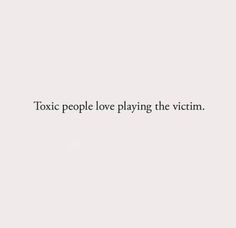 a white wall with words on it that says, totic people love playing the victim