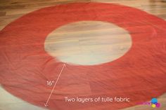 the circle rug is made with two layers of tulle fabric, and one layer of yarn