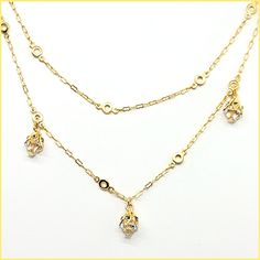 This beautiful necklace has a unique design - a very long chain that can be worn long or doubled, with the help of a toggle closure. It features tulip-shaped crystal drops set along half of the chain. Made of durable and beautiful 14kt gold-plated brass and enhanced with the finest European crystals. The full length is 42" or 20" when doubled. Made in the USA by La Vie Parisienne Gold Drop Chain Necklaces, Gold Drop Necklace With Chain, Gold Long Dangle Necklace With Chain, Elegant Gold Chain Dangle Charm Necklaces, Gold Long Drop Chain Necklaces, Gold Long Drop Chain Necklace, Gold Dangle Drop Necklace With Chain, Elegant Dangle Drop Necklace With Chain, Gold Drop Necklace With Dangle Chain