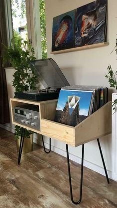 an old record player is turned into a table