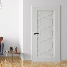 a living room with white walls and wooden floors