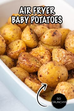 A white dish full of crispy baby potatoes. Air Fryer Mini Potato Recipe, Air Fry New Potatoes, Teeny Tiny Potatoes Recipes Air Fryer, Air Fry Mini Potatoes, Cooking Mini Potatoes, Air Fried Mini Potatoes, Air Fryer Smashed Potatoes Recipe, Air Fryer Small Roasted Potatoes, Small Red Potato Recipes Air Fryer