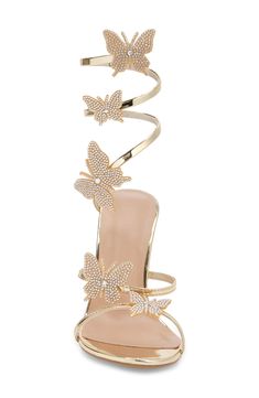 Embellished butterflies enhance the whimsical effect of a lofty sandal with straps covered in shimmering crystals. 3 3/4" heel Leather upper/synthetic lining and sole Imported Butterfly Strap Heels, Mermaid Heels, Butterfly Heels, Butterfly Sandals, Holiday Party Fashion, Gold Mermaid, Birthday Inspo, Mens Holiday, 17th Birthday