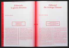 an open book with red text on the front and back cover is shown in black