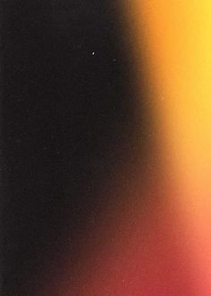 a blurry image of an orange and yellow object