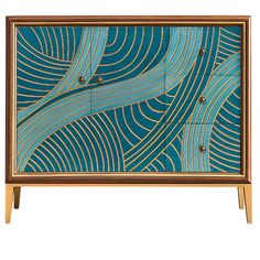 a blue and gold cabinet with an abstract design