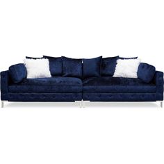 a blue couch with white pillows on it