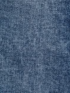 the back side of a pair of blue jeans, with some small holes in it