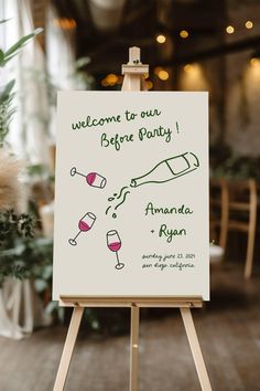 an easel with a sign that says welcome to our before party and wine glasses on it