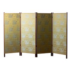 four panel screen with gold and white designs on it's sides, in front of a white background