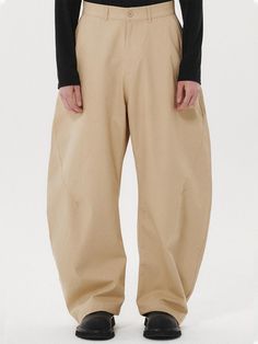 It is an oversized chino pant. The pant silhouette is adjustable using drawcords on the hem. The curved seam makes exaggerated balloon silhouette.- Button, zipper closure- Side pockets- Back pockets- Drawcords on the hem Fashion Library, Balloon Silhouette, Balloon Pants, Mens Trousers, Chinos Pants, Milk, Trousers, Mens Outfits, Zipper