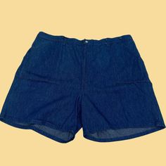 Vintage denim shorts, manufactured ca. 1970s, still with the original tags attached. Moonshine (Lane & Bryant) brand plus size women's shorts in size 44 (could be worn fashionably by either gender today).     - Brand: Moonshine (Lane & Bryant)    - Size: Size 44    - Time Period: 1970s    - Color(s): Denim blue    - Materials: 100% cotton    - Made in: Made in USA    - Condition: In new old stock, vintage condition with original tags (this piece was stored in a dresser after purchase and never w Retro Wide Leg Cotton Shorts, Retro Cotton Cutoff Shorts, Retro Short Denim Shorts, Retro Denim Bottoms With Built-in Shorts, Retro Relaxed Fit Denim Shorts, Vintage Denim Jean Shorts For Summer, Retro Style Medium Wash Shorts For Summer, Retro Jean Shorts With Pockets, Retro Medium Wash Shorts For Summer