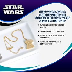 the star wars necklace is on display with other items