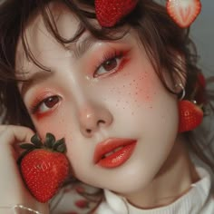 Elevate your look with red winged eyeliner and strawberry gem freckles for a sweet spring vibe! 🍓💫 #StrawberryMakeup #WingedEyeliner #SpringBeauty #GemFreckles #RedEyeliner #FruitInspiredMakeup #SpringTrends #BeautyInspiration #StrawberryVibes #GlowingSkin #MakeupGoals #SpringLooks #BeautyAddict #MakeupInspo #FreckleMakeup #FlawlessFinish #TrendyMakeup #StrawberryFreckles #GlamorousLook #SpringGlow Strawberry Makeup Look Korean, Strawberry Makeup Trend, Strawberry Shortcake Eye Makeup, Apple Makeup Look, Cute Strawberry Makeup Look, Strawberry Themed Makeup, Strawberry Make Up Ideas, Strawberry Fairy Costume, Star Freckles Makeup