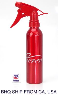 a red spray bottle with the word even written on it