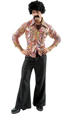 a man with an afro is posing for the camera while wearing black pants and a colorful shirt