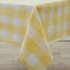 a yellow and white checkered table cloth