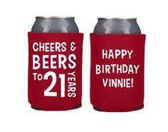 two red can coolers with cheers and beers to celebrate 21st birthday, one has the number 21 on it