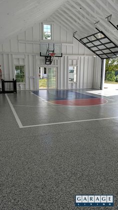 an indoor basketball court in the middle of a building