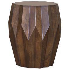 a wooden stool with an unusual design on it's top and bottom, made out of wood