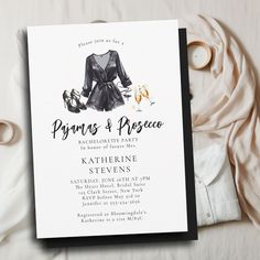 a black and white wedding card with an image of a woman's dress on it