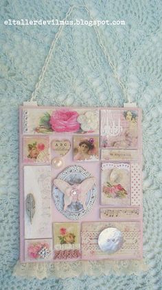 a pink and white wall hanging with pictures on it's side, some lace around the edges