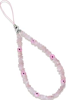 a pink beaded necklace with an eye charm hanging from it's end, on a white background