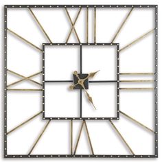 a square clock with gold and black trimmings on it's face is shown