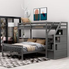 a bunk bed sitting in the middle of a room