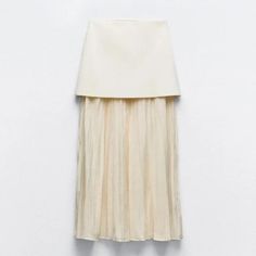 New With Tag Zara S/S 2024 Collection Skirt With A High Elastic Waist. Matching Pleated Semi-Sheer Fabric. Side Hidden In-Seam Zip Closure. Ecru 4192/016 Composition: Outer Shell Main Fabric 54% Polvester 35% Viscose 11% Polyamide Secondary Fabric 74% Viscose 26% Polyamide Which Has At Least: Outer Shell Main Fabric 54% Rcs-Certified Recycled Polyester Clothing Care Guide: Machine Wash Max. 30c/86f Delicate Cycle Do Not Use Bleach / Whitener Iron Maximum 110c/230f Do Not Dry Clean Do Not Tumble Cream Pleated Skirt Outfit, Ruffle Long Skirt, Pleated Skirt Outfit, Pleated Knit, Skirt With Pleats, High Waisted Pleated Skirt, Clothing Reference, Zara Skirts, Zara White