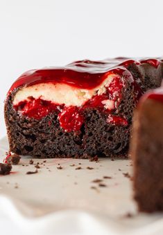 a piece of chocolate cake with strawberry filling