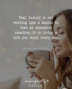 a woman holding a cup and smiling while looking at her cell phone with the caption real luxury is not working like a menic to take an expensive vacation