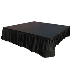 a black table cloth with pleated edges