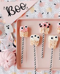 there are marshmallows with eyes on them and candy sticks in the shape of owls