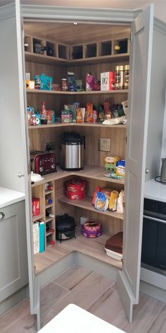 an open pantry with lots of food in it