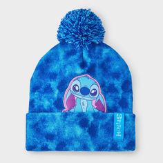 a blue beanie with an image of stitching on it