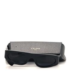 This is an authentic pair of CELINE Acetate Sunglasses CL40260I in Black. These stylish sunglasses have black rims with dark grey lenses, and feature the Celine logo at the hinge. Celine Logo, Black Rims, Acetate Sunglasses, Stylish Sunglasses, Grey Lenses, Dark Grey, Lenses, Sunglasses, ? Logo