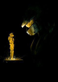 a man in the dark with his face covered by yellow powder and wearing a helmet