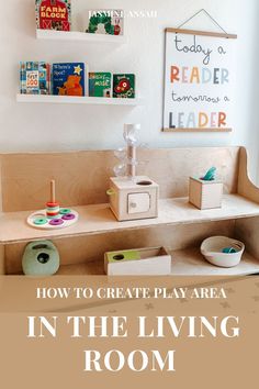 a play area in the living room with toys and books on the shelves above it